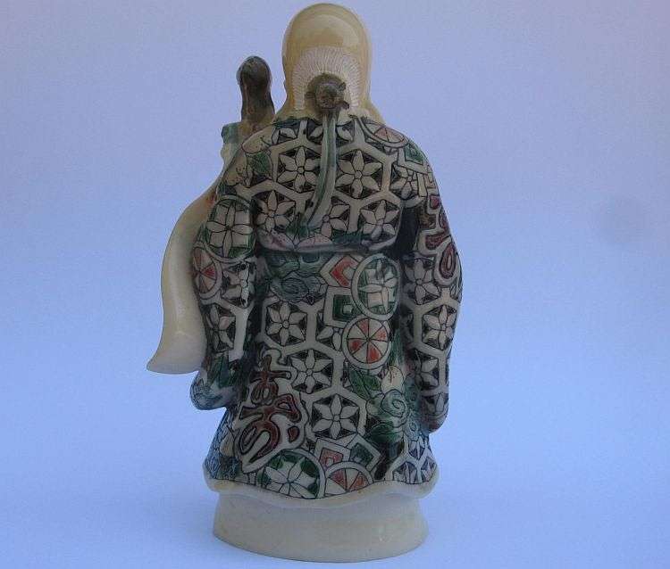 A SUPERB SIGNED VINTAGE ORIENTAL FIGURE OF AN IMMORTAL ...NOT SURE OF COMPOSITION ...VERY COOL !!