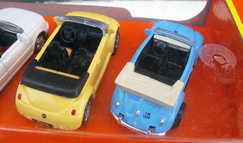 TOTALLY COOL DEAL !! A SET OF 4 DIE CAST VOLKSWAGEN CABRIOLET CARS IN 1:43 SCALE ...BOXED !! WOW !!