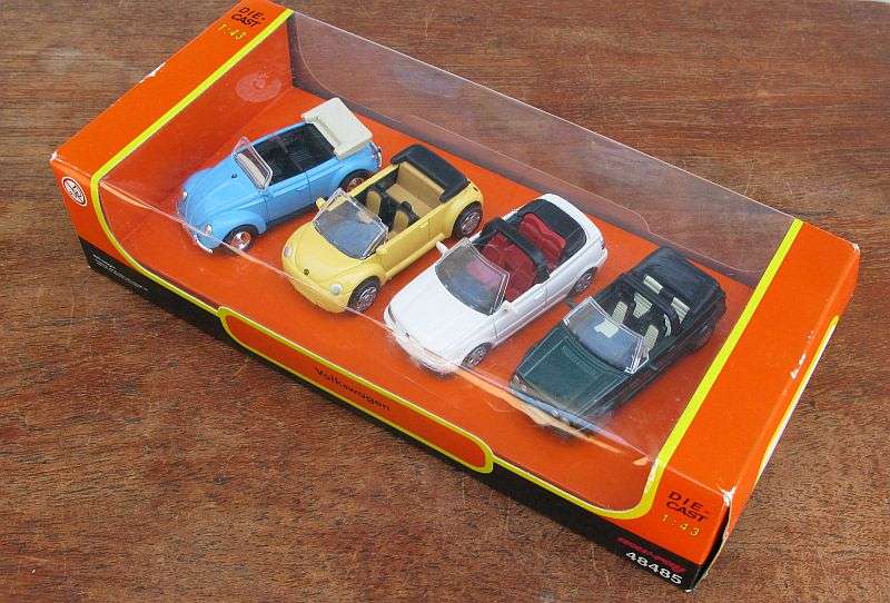 TOTALLY COOL DEAL !! A SET OF 4 DIE CAST VOLKSWAGEN CABRIOLET CARS IN 1:43 SCALE ...BOXED !! WOW !!