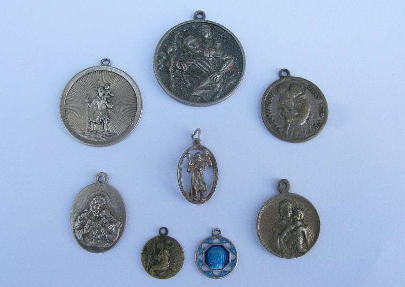A STUNNING COLLECTION OF 8 RELIGIOUS MEDALLIONS INCLUDING A FRENCH STERLING SILVER ENAMELED MADONNA