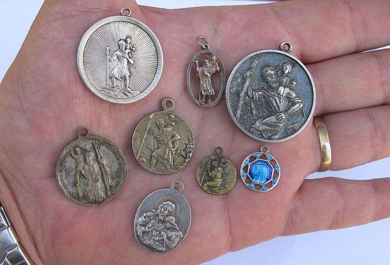 A STUNNING COLLECTION OF 8 RELIGIOUS MEDALLIONS INCLUDING A FRENCH STERLING SILVER ENAMELED MADONNA