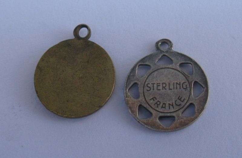 A STUNNING COLLECTION OF 8 RELIGIOUS MEDALLIONS INCLUDING A FRENCH STERLING SILVER ENAMELED MADONNA