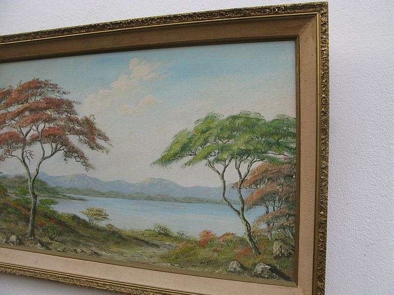 A STUNNING ORIGINAL OIL ON BOARD OF A RIVER AND LANDSCAPE BY ARTIST DIEUWIE HOLTHUYSEN DATED 1983