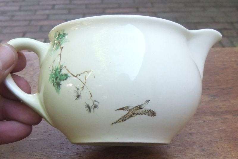 A LOVELY ART DECO PERIOD GRAVY BOAT BY ROYAL DOULTON IN ""THE COPPICE "" PATTERN