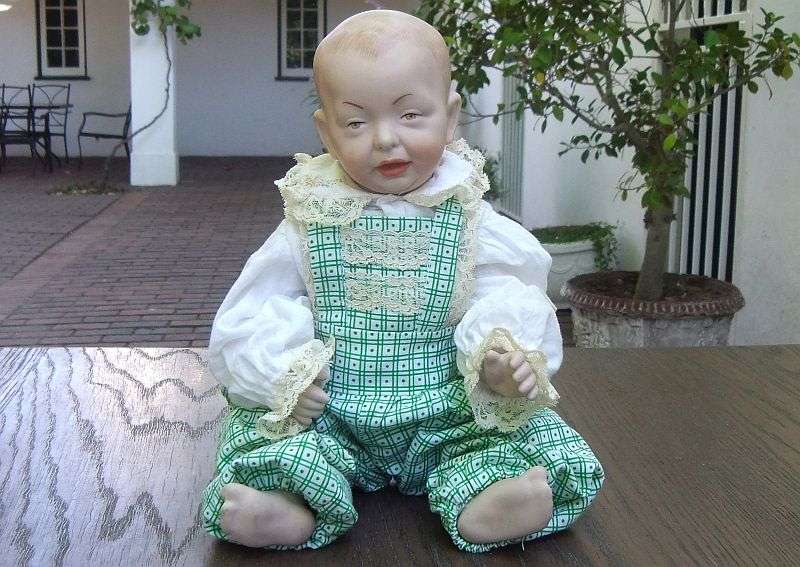 AN OLD PORCELAIN DOLL WITH INTERESTING MAKERS MARKS...HEXAGRAM AND NUMBERS ...EXCELLENT QUALITY