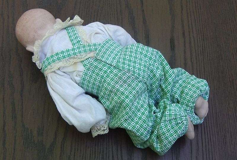 AN OLD PORCELAIN DOLL WITH INTERESTING MAKERS MARKS...HEXAGRAM AND NUMBERS ...EXCELLENT QUALITY