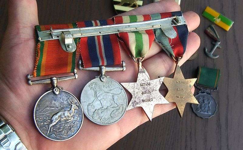 AN AWESOME FULL SIZED SET OF WW2 MEDALS PLUS EXTRA MEDALLIONS AND BITS N BOBS !! BID FOR ALL !!