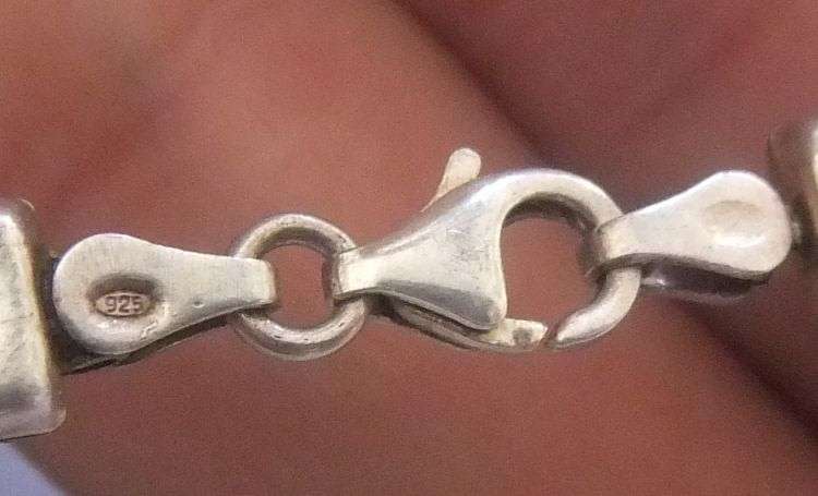 A GORGEOUS VINTAGE STERLING SILVER BRACELET SET WITH FACETED PURPLE STONES !! HINGED !! MUST HAVE !!