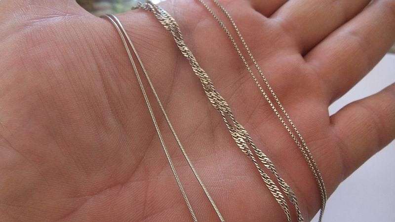 WOW !! THREE STERLING SILVER NECKLACES WITH THREE STERLING SILVER CROSS PENDANTS !! BID FOR THE LOT