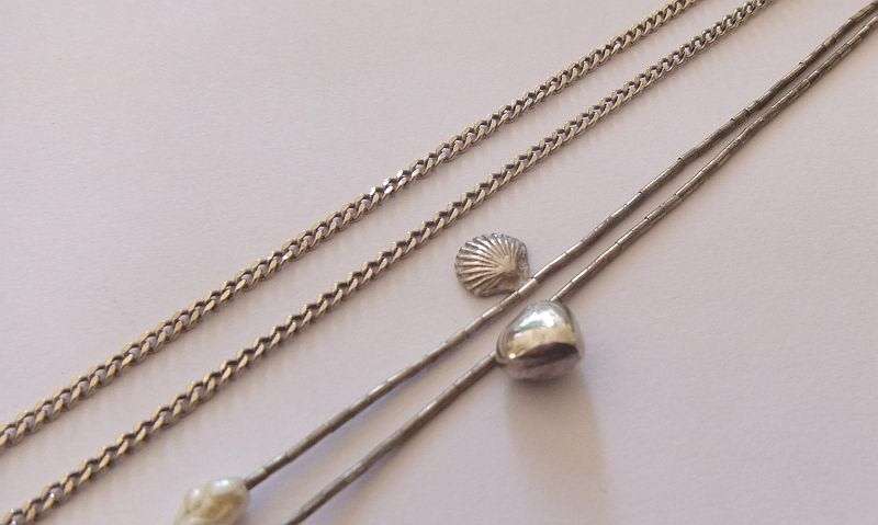 AWESOME !! ONE "CHARMING" STERLING SILVER NECKLACE AND AN UNUSUAL PENDANT WITH CHAIN...ALL SILVER !!