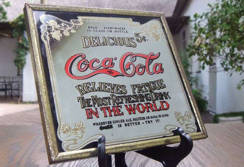 A TOTALLY COOL VINTAGE MINI ADVERTISING MIRROR FOR COCA-COLA...RELIEVES FATIGUE...ALLOT OF CHARACTER