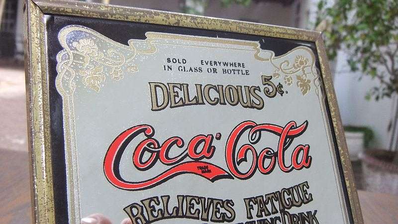 A TOTALLY COOL VINTAGE MINI ADVERTISING MIRROR FOR COCA-COLA...RELIEVES FATIGUE...ALLOT OF CHARACTER