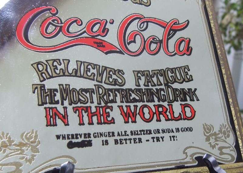 A TOTALLY COOL VINTAGE MINI ADVERTISING MIRROR FOR COCA-COLA...RELIEVES FATIGUE...ALLOT OF CHARACTER