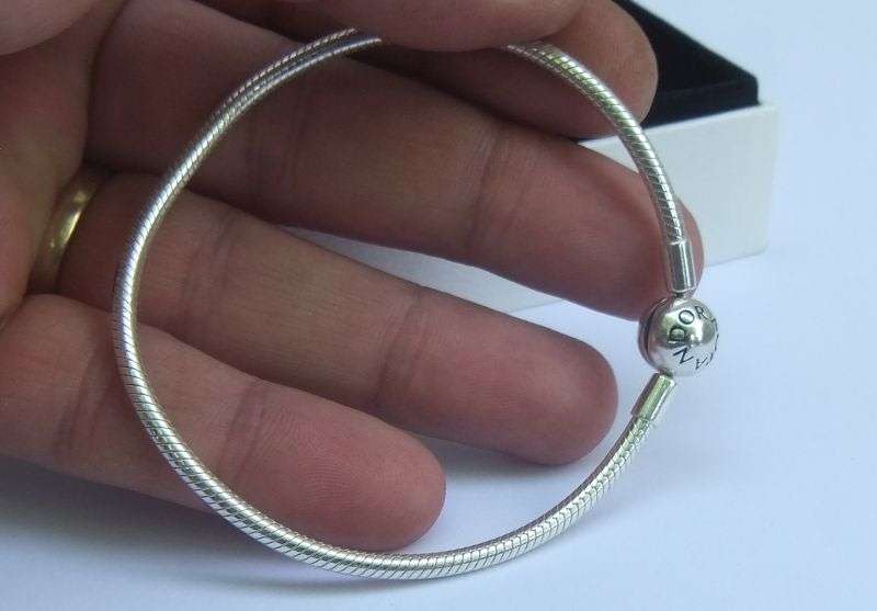 GOOD AS NEW !! A BOXED SOLID STERLING SILVER BRACELET BY ""PANDORA"" IN UNUSED CONDITION !! WOW !!