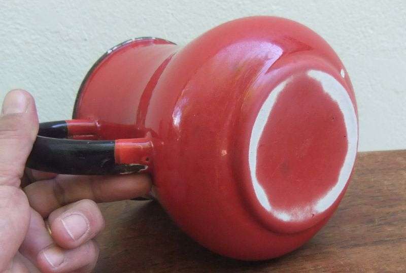 AN EYE CATCHING RARE VINTAGE RED ENAMEL WATER JUG