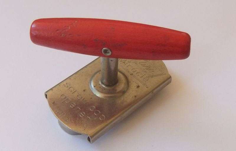 A VINTAGE SCREW CAP REMOVER BY SKYLINE ENGLAND