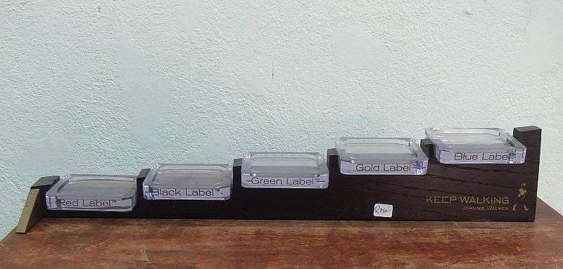 A RARE VINTAGE JOHNNIE WALKER WHISKEY BOTTLE DISPLAY STAND
