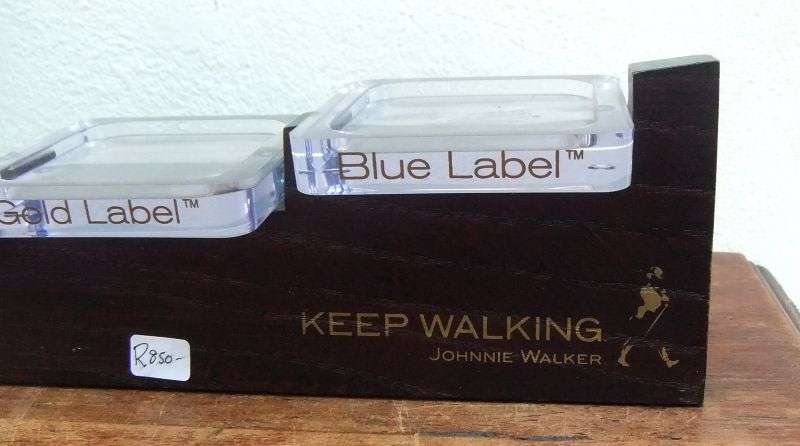 A RARE VINTAGE JOHNNIE WALKER WHISKEY BOTTLE DISPLAY STAND