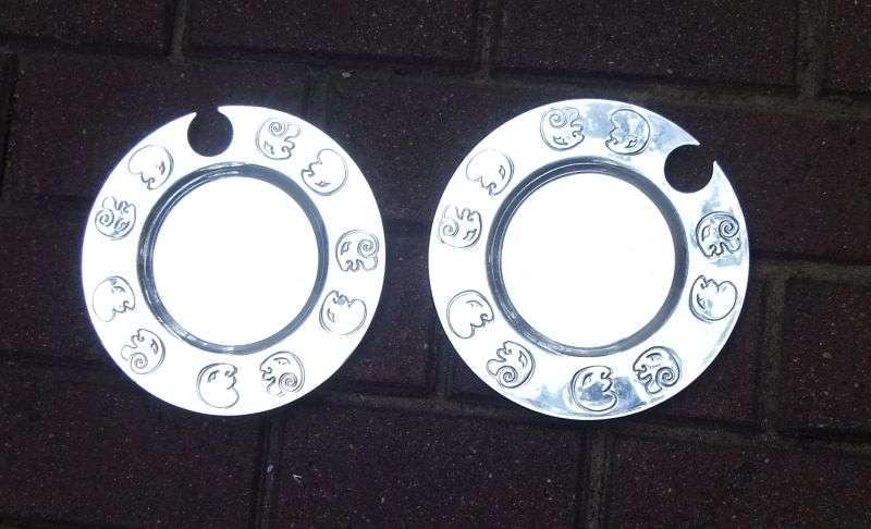 TWO EYE CATCHING METAL PLATES BY DESIGNER CARROL BOYES - BID FOR BOTH