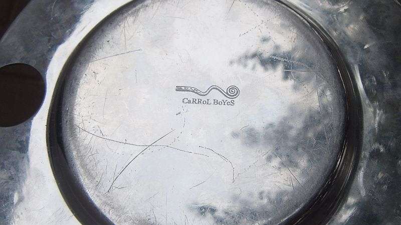 TWO EYE CATCHING METAL PLATES BY DESIGNER CARROL BOYES - BID FOR BOTH