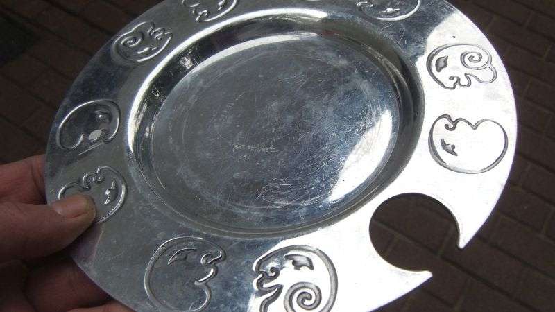 TWO EYE CATCHING METAL PLATES BY DESIGNER CARROL BOYES - BID FOR BOTH