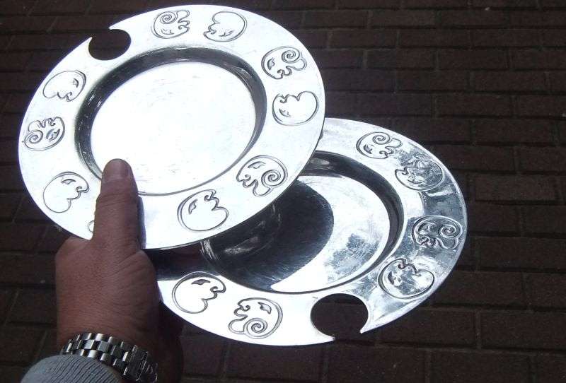 TWO EYE CATCHING METAL PLATES BY DESIGNER CARROL BOYES - BID FOR BOTH