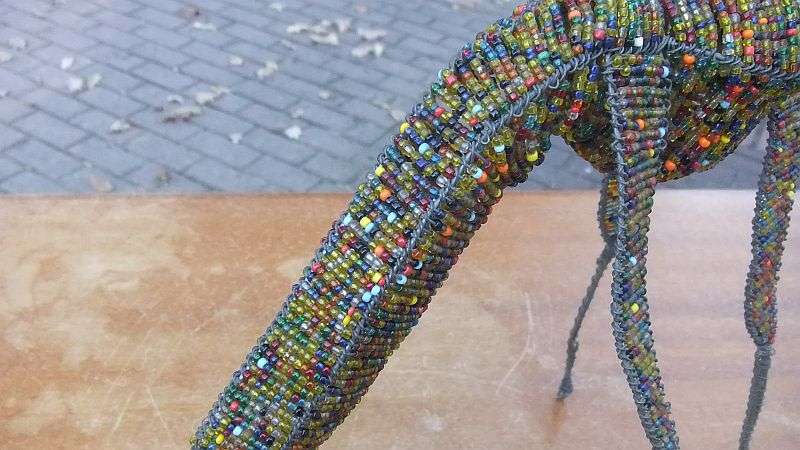 AN INTRICATELY MADE TALL VINTAGE AFRICAN BEAD WORK GIRAFFE ORNAMENT ... COOL FIND !!