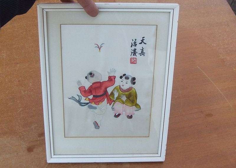 AN EYE CATCHING VINTAGE CHINESE EMBROIDERY...POSSIBLY SILK... FINE DETAIL WITH CHINESE CHARACTERS