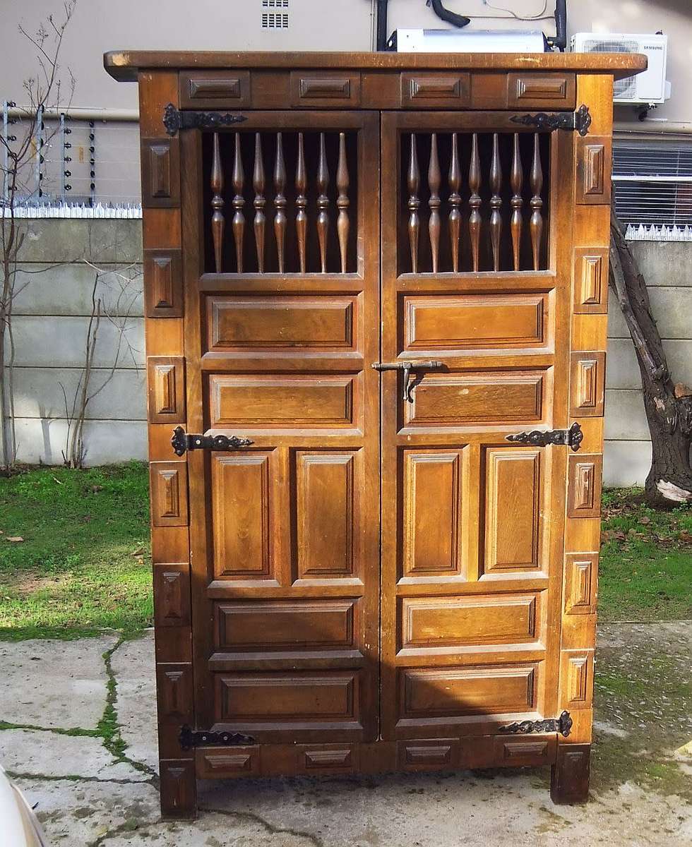 A VINTAGE TEAK STORAGE / BOOK CUPBOARD FIT FOR YOUR CASTLE