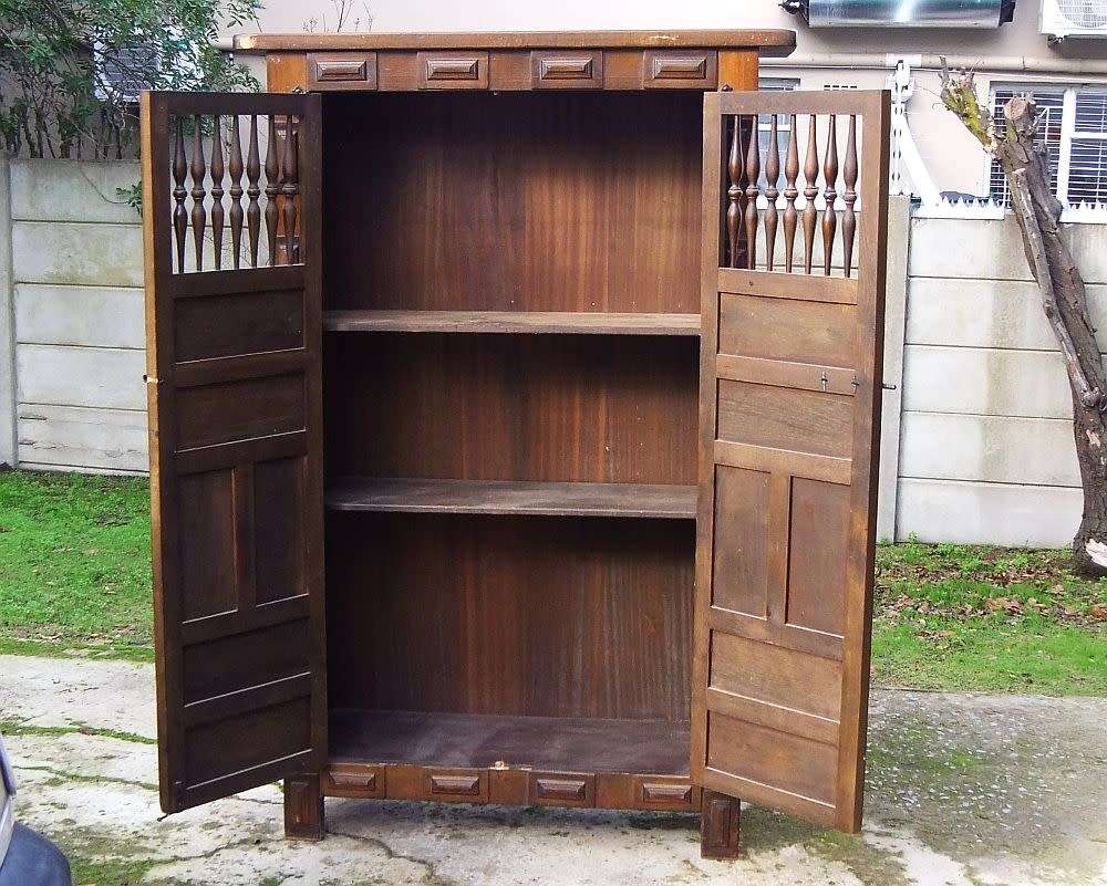A VINTAGE TEAK STORAGE / BOOK CUPBOARD FIT FOR YOUR CASTLE