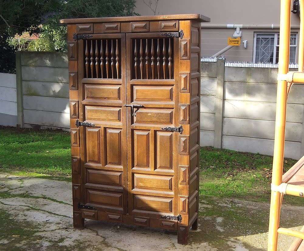 A VINTAGE TEAK STORAGE / BOOK CUPBOARD FIT FOR YOUR CASTLE
