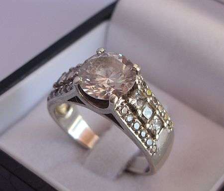A VERY CLASSY SOLID STERLING SILVER FACETED CZ SET RING MADE FOR AMERICAN SWISS - JUST WOW !!