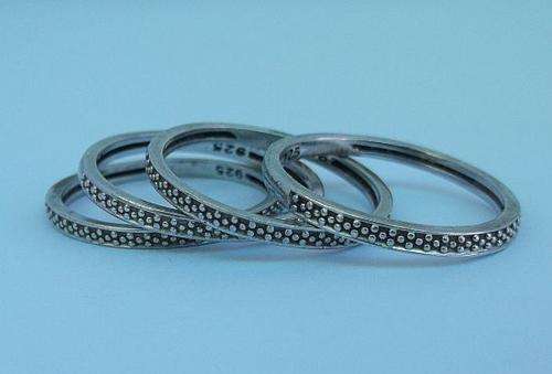 A STUNNING 4 PIECE STERLING SILVER STACKING RING !!! GREAT CONDITION !!! AWESOME LOOK !!!