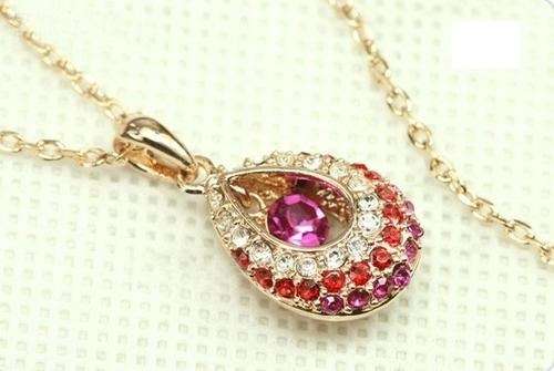 EXQUISITE YELLOW GOLD TONE TEAR DROP CRYSTAL NECKLACE - RED WITH PINK AND WHITE CRYSTALS