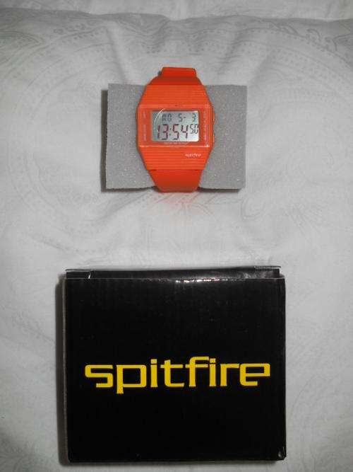 Brand new ladies funky orange spitfire watch.