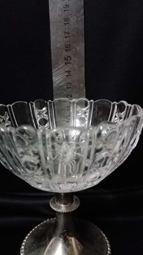 Glass nut bowl with metal foot- German Made