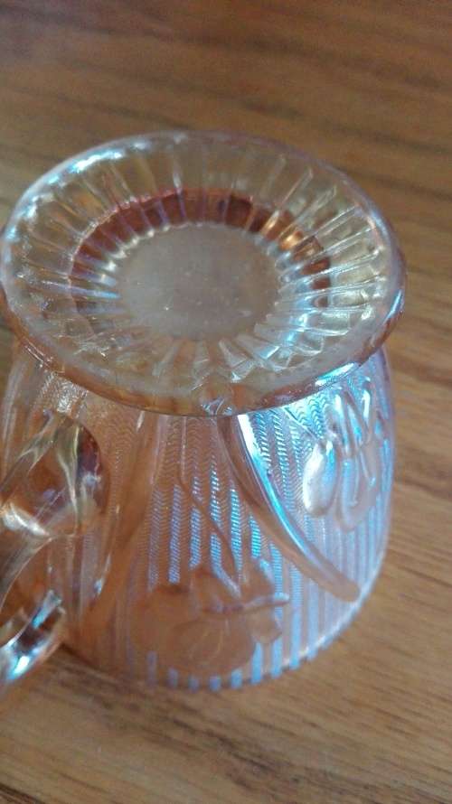 Carnival glass iris and herringbone sugar bowl