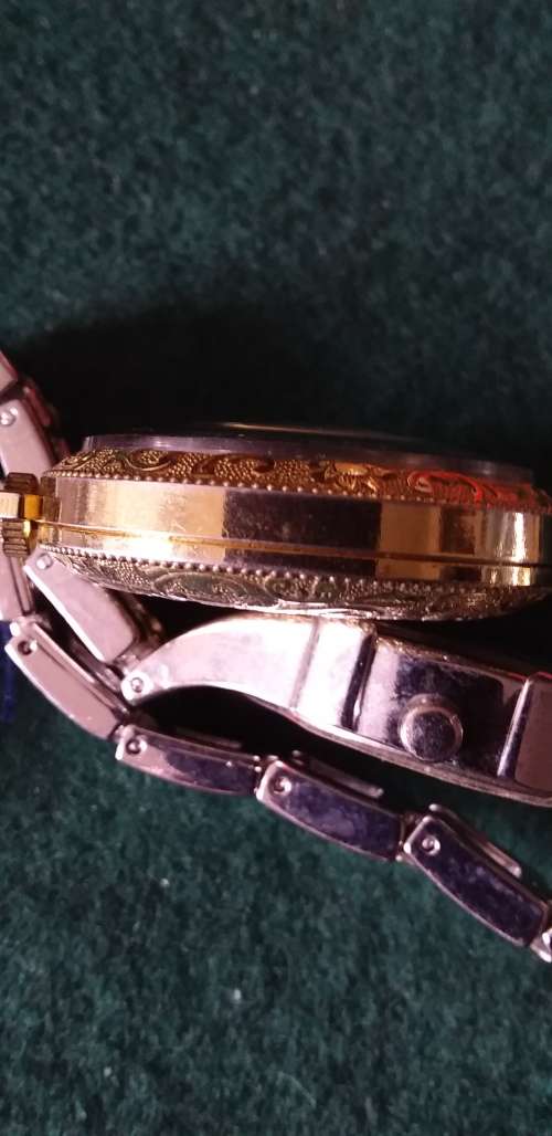 A Ladies Silver Tone Wrist Watch And A Gold Tone Pendant Watch - (Not Working)