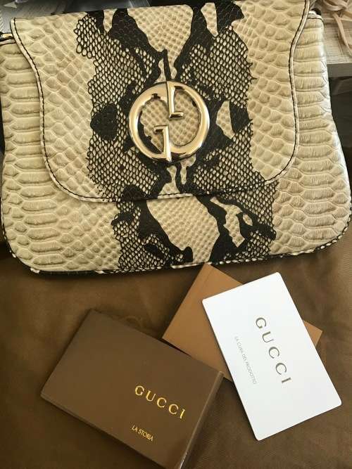 PRICED TO SELL Gucci 1969 Clutch Genuine Leather