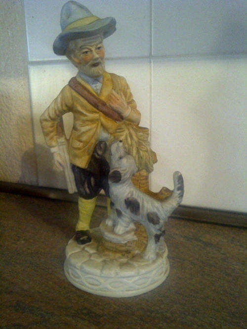 Lovely figurine of an old man with his dog