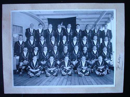 Team photograph of 1951/52 Springbok team. Signed by Tjol Lategan