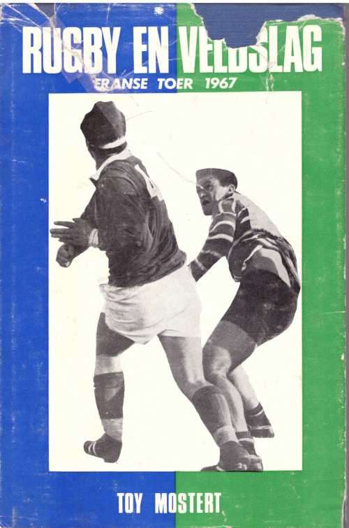 Rugby en Veldslag by Toy Mostert. HC DW 116 pp DW in poor condition. See image