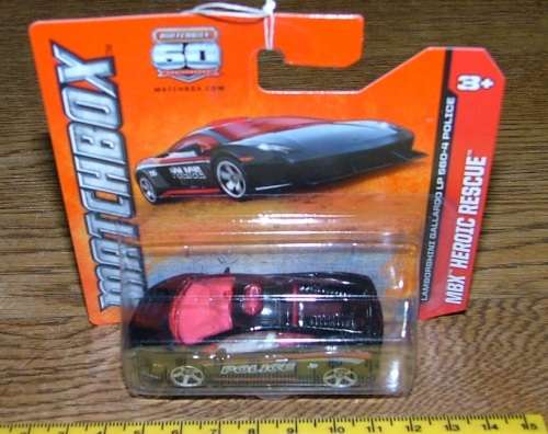 2012  Matchbox 60th ~ Y8951-0818 ~ Lamborghini Gallarod LP 560-4 police ~ Mint on short card