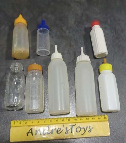 Baby doll, bottles  lot mixed