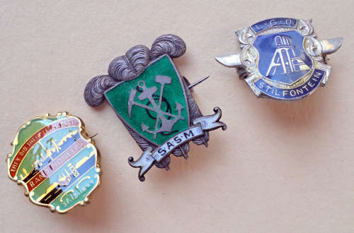 A vintage rare S.A.S.M railway Sterling Silver pin badge plus Rand Pioneers and Stilfontein Mine pin