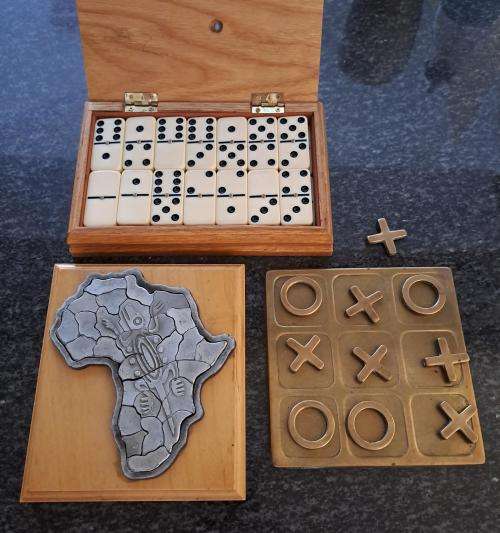 Noughts and Crosses in brass, vintage Domino box set and Africa Metal Puzzle (roughly 20 cm x 15 cm)