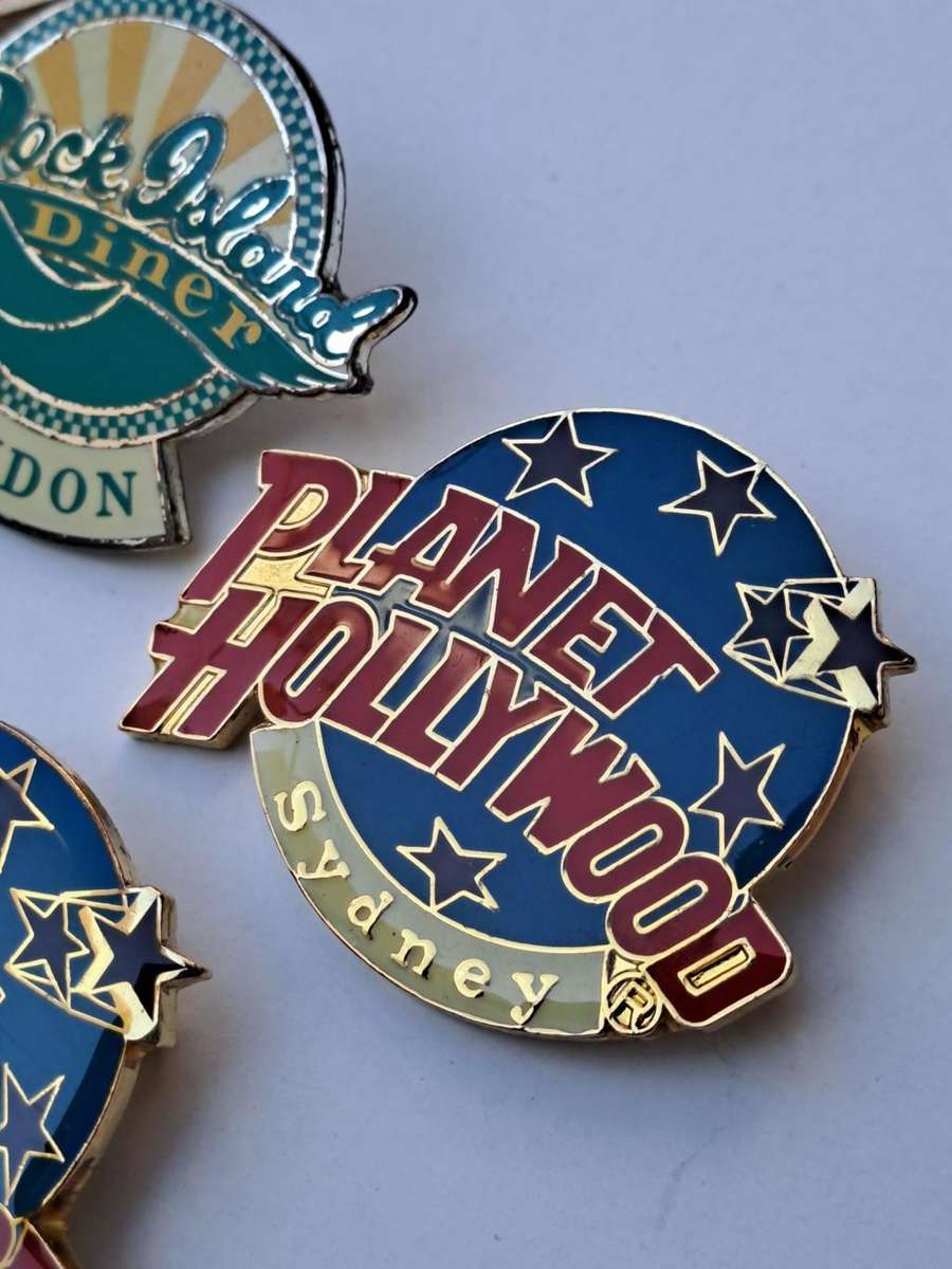Planet Hollywood 7 Vintage Pin badges 1990s. The restaurant was founded in New York City in 1999