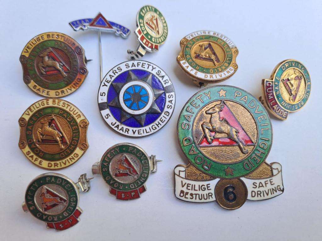 S.A R. Railway 5-Year Safety badge (sterling silver hallmarking) + 9 x SA Road Safety pin badges