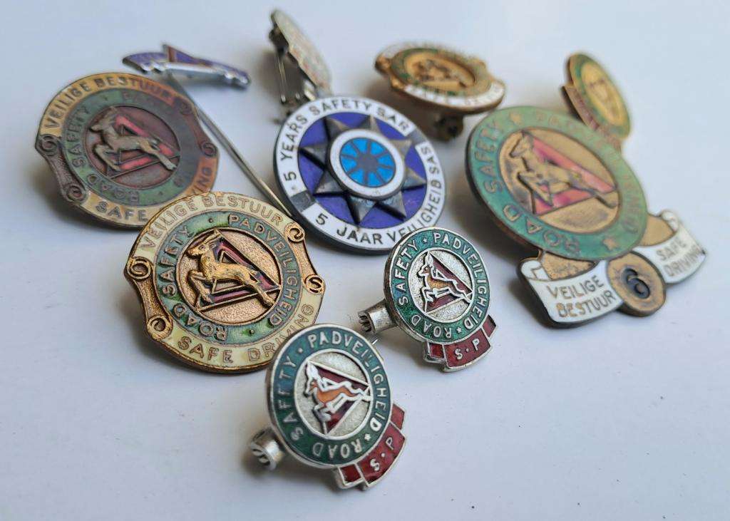 S.A R. Railway 5-Year Safety badge (sterling silver hallmarking) + 9 x SA Road Safety pin badges
