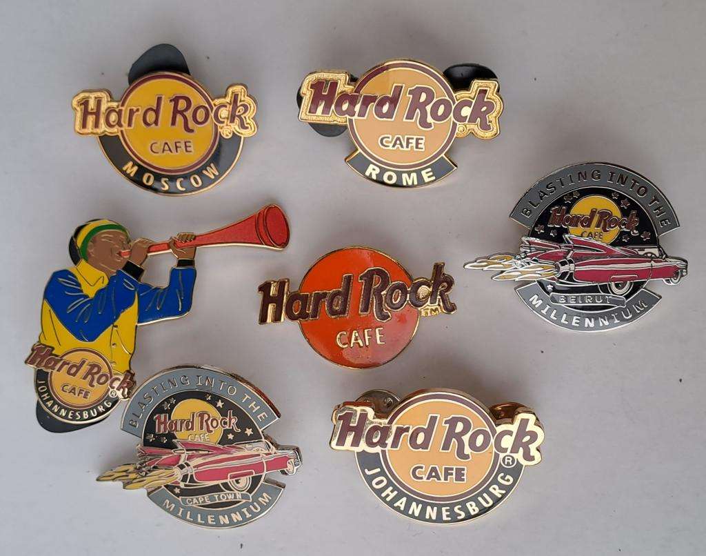 Hard Rock Cafe vintage pin badges  7 in total, one being the classic old style Hard Rock logo